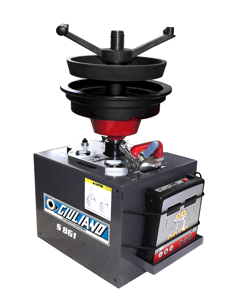 Hand-spin wheel balancer for mobile truck tire service